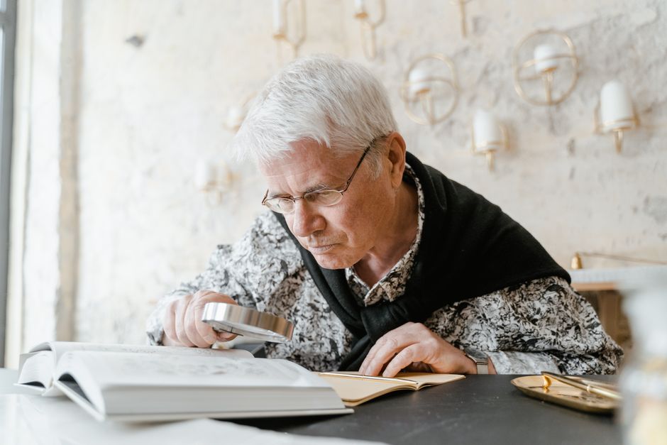 Elderly patient reading with age-related vision